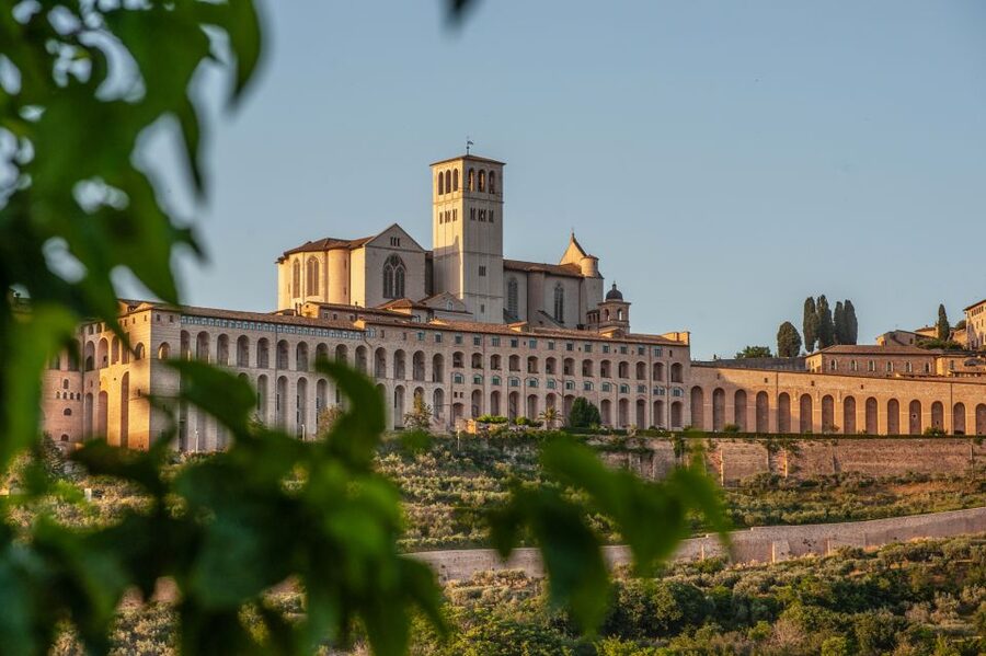 Assisi: Walking Tour with St. Francis Basilica Visit - Roman stone and the view of Rocca Maggiore