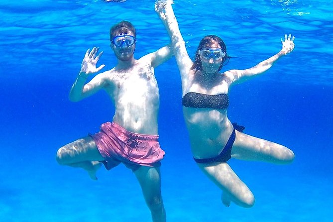 Boat Tour Egadi Day discover Favignana and Levanzo from Trapani - Cala Rossa: beautiful water, limited beach time