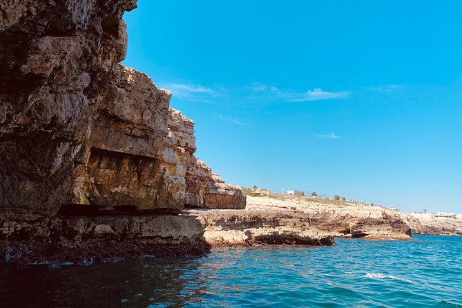 Boat tour of the Polignano a Mare caves with aperitif - Grottone and the sea entrance to an old cinema