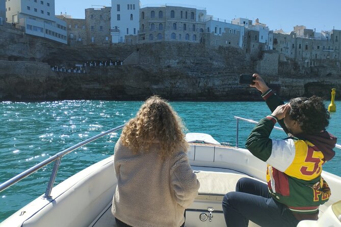 Boat trip to the Polignano a Mare caves - Entering Grotta Palazzese and the smaller caves