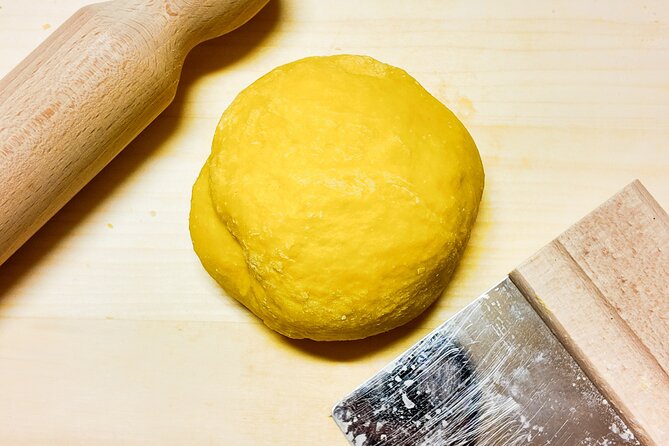 Bologna Local Pasta Cooking Class, Ragu, Spritz, Wine & Gelato - Cutting tagliatelle for the ragù