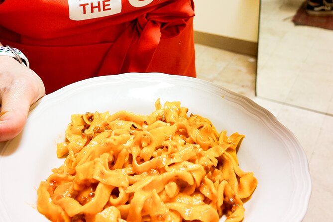 Bologna Local Pasta Cooking Class, Ragu, Spritz, Wine & Gelato - Sitting down to tagliatelle al ragù