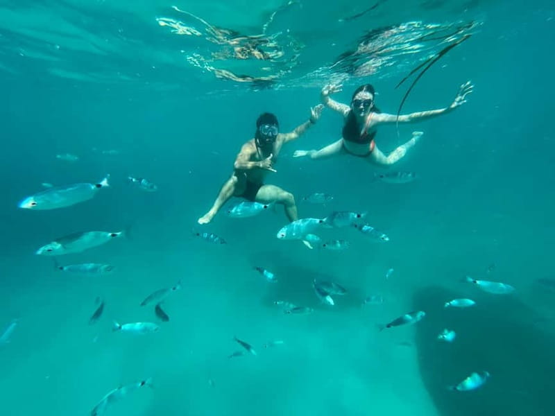 Cagliari: Boat Tour with 4 Swim Stops, Snorkeling & Prosecco - Leaving Via Roma for Devil’s Saddle