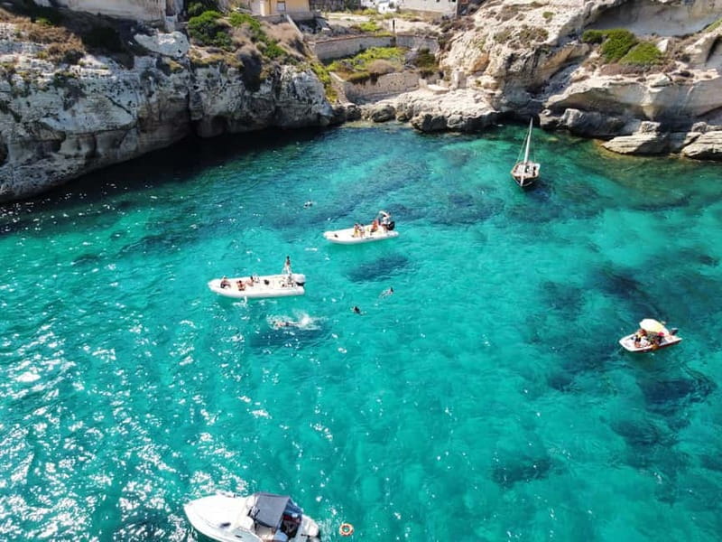 Cagliari: Boat Tour with 4 Swim Stops, Snorkeling & Prosecco - Cala Fighera and the rocky coast