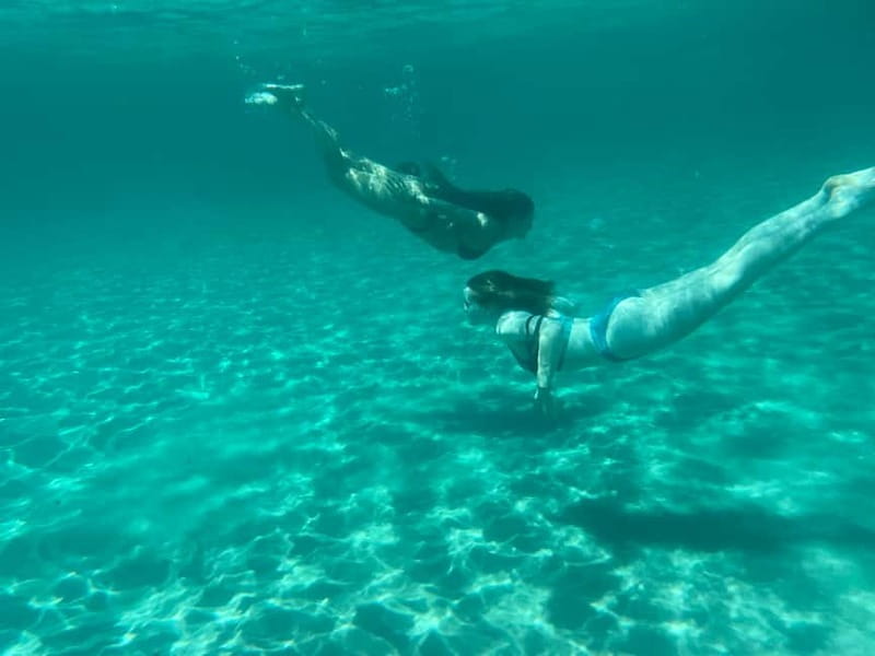 Cagliari: Boat Tour with 4 Swim Stops, Snorkeling & Prosecco - Marina Piccola and Poetto