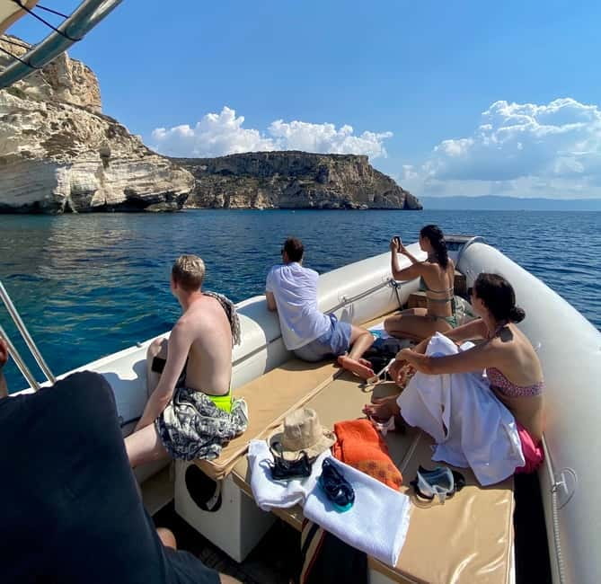 Cagliari: Boat Tour with Snorkeling, GoPro & Sardinian Beer - Speeding Along the Cagliari Coast