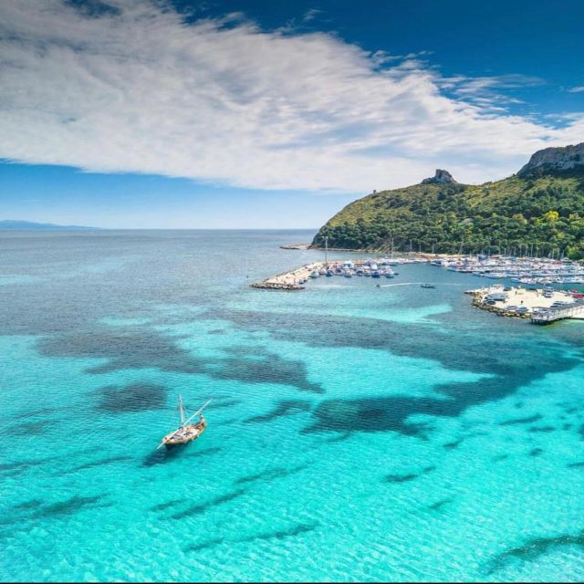Cagliari: Boat Tour with Swim Stops, Snorkeling, & Aperitif - Cala Bernat: an early swim in clear water