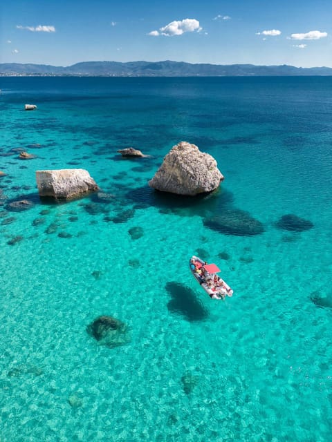 Cagliari: Devil's Saddle Boat Tour with Spritz and Chips - Leaving Cagliari by speedboat