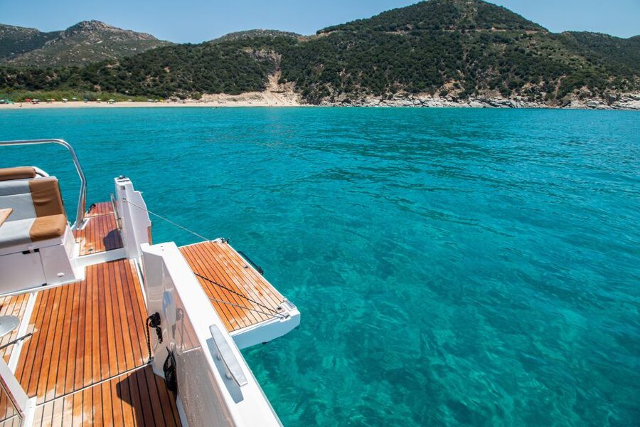 Cagliari: Luxury Motorboat Tour with 3 Swim Stops & Wine - The modern Beneteau boat and small-group feel