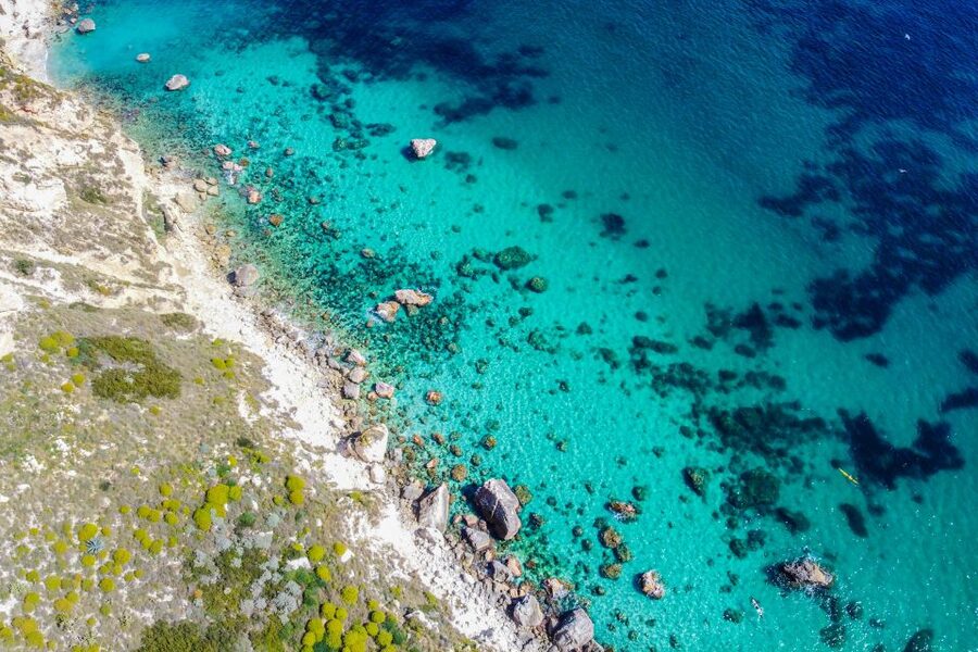 Cagliari: Luxury Motorboat Tour with 3 Swim Stops & Wine - Cruising past Poetto and the Devil’s Saddle
