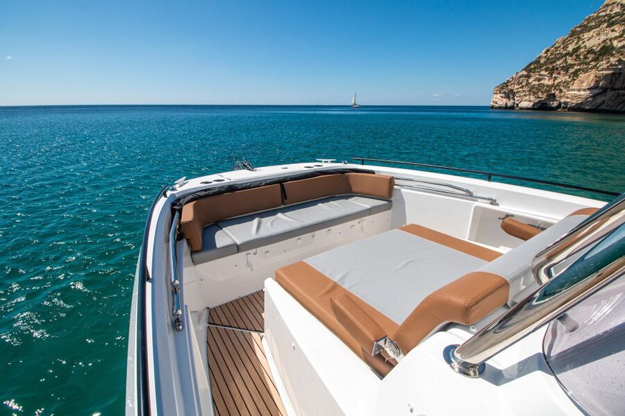 Cagliari: Luxury Motorboat Tour with 3 Swim Stops & Wine - Cala Fighera and the limestone coast