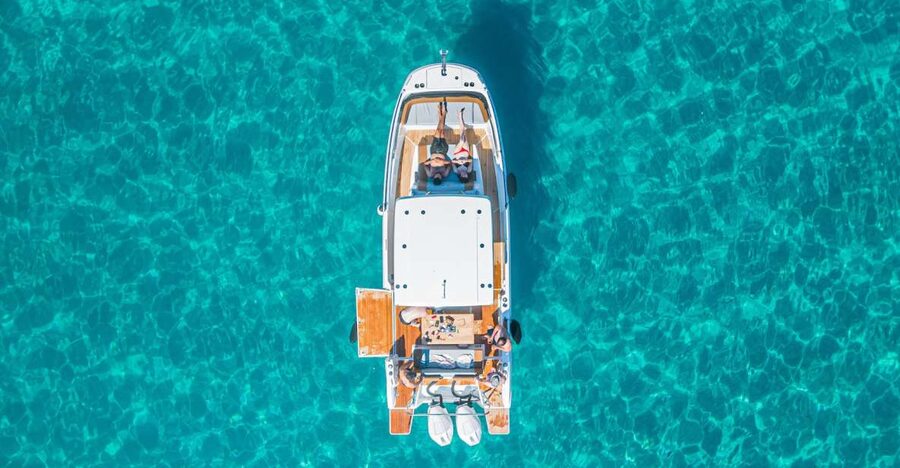 Cagliari: Luxury Motorboat Tour with 3 Swim Stops & Wine - Boarding at Marina Piccola beside Poetto Beach