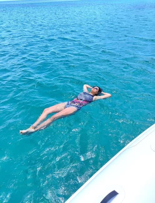 Cagliari: More Than a Boat Tour; Snack, Swim, Sip & Snorkel - Grotta dei Colombi and Sella del Diavolo