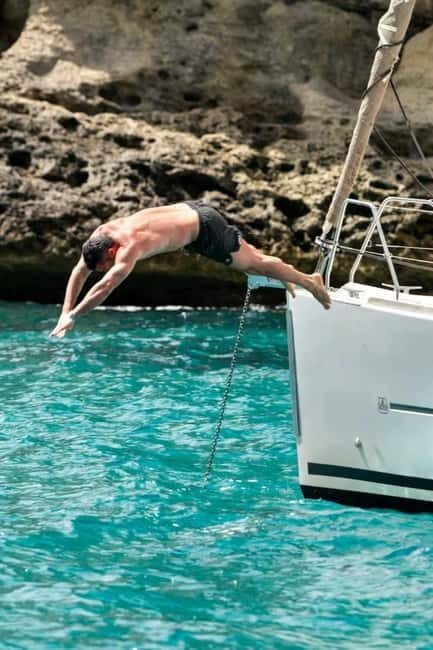 Cagliari: Sailing Tour with 4 Stops, Snorkeling and Prosecco - Safety, comfort, and what to pack