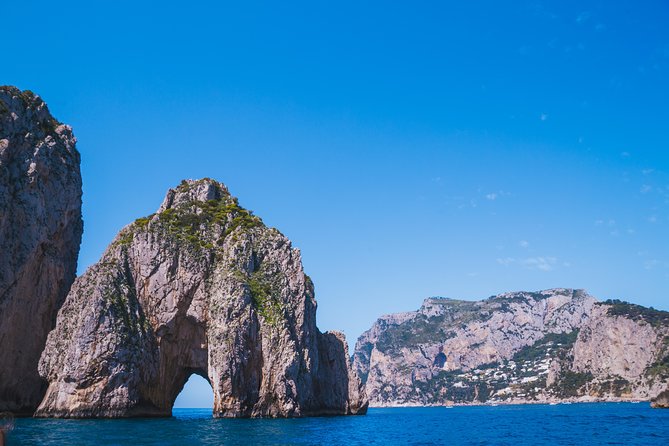 Capri Boat Tour: Grottoes, Swim & Sip Limoncello in a Small Group - Checking in at Marina Grande
