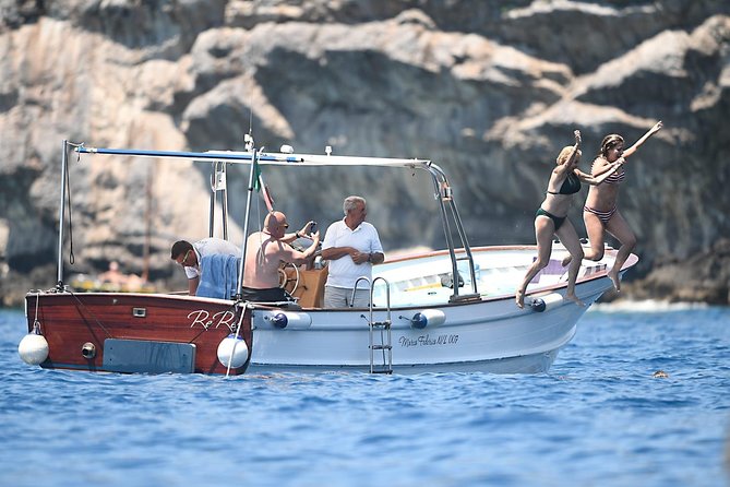 Capri Boat Tour: Grottoes, Swim & Sip Limoncello in a Small Group - Natural Arch and the Malaparte villa