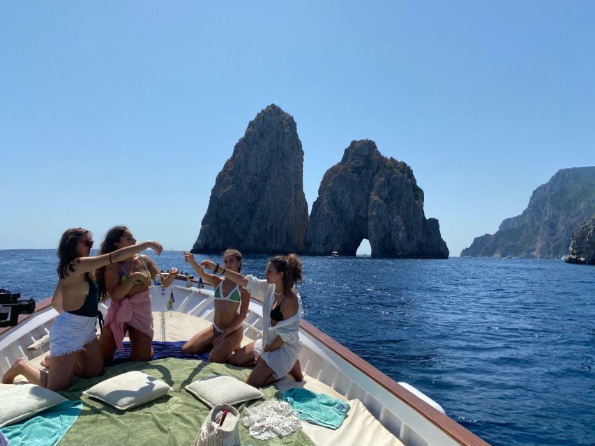 Capri: Island and Grottos Boat Cruise with Snacks and Drinks - The Natural Arch and Casa Malaparte