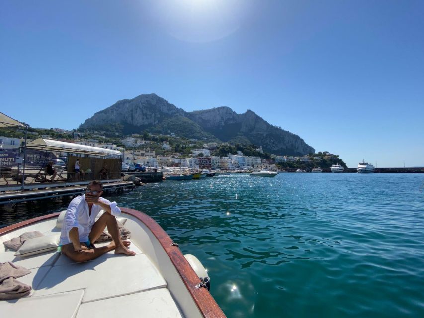 Capri: Island and Grottos Boat Cruise with Snacks and Drinks - The Arch of Love and Faraglioni