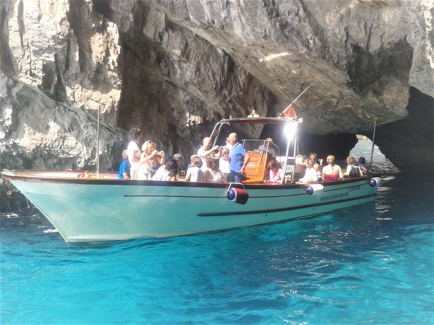 Capri: Island Boat Tour with Blue Grotto Stop - The Faraglioni Rocks are the tour’s signature moment