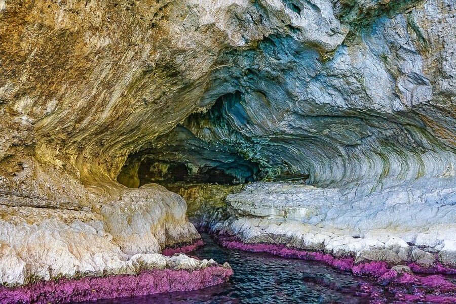 Capri: Island Boat Tour with Blue Grotto Stop - Marina Piccola and the southern coast slow the pace