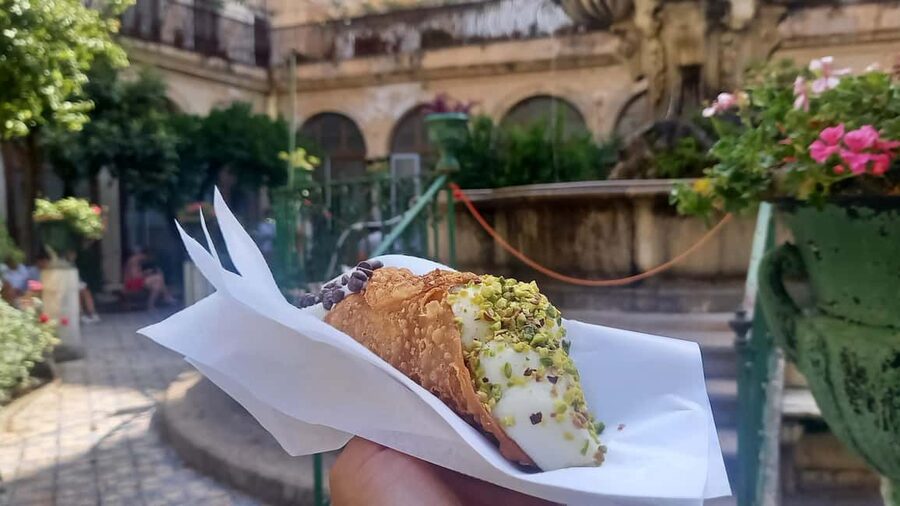 Catania: Street Food Guided Walking Tour - The Roman Amphitheater and Sicilian caponata