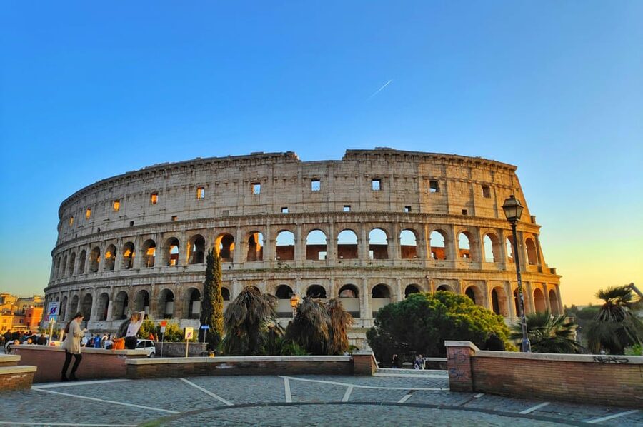 Colosseum Entry with digital audioguide and arena option - Walking through the Roman Forum