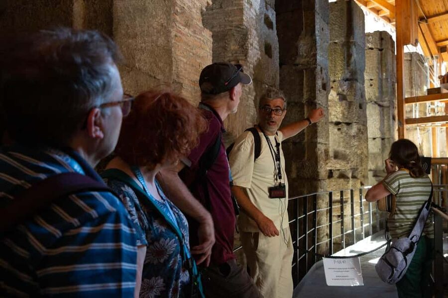 Colosseum Special Access Tour, with Ancient Temples & Tombs - Entering the Colosseum through the Gladiators’ Gate