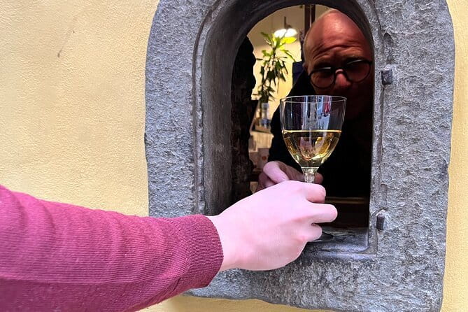 Florence Evening Food Tour with Florentine Steak & Tuscan Wine - A single raviolo with wine at Tamerò