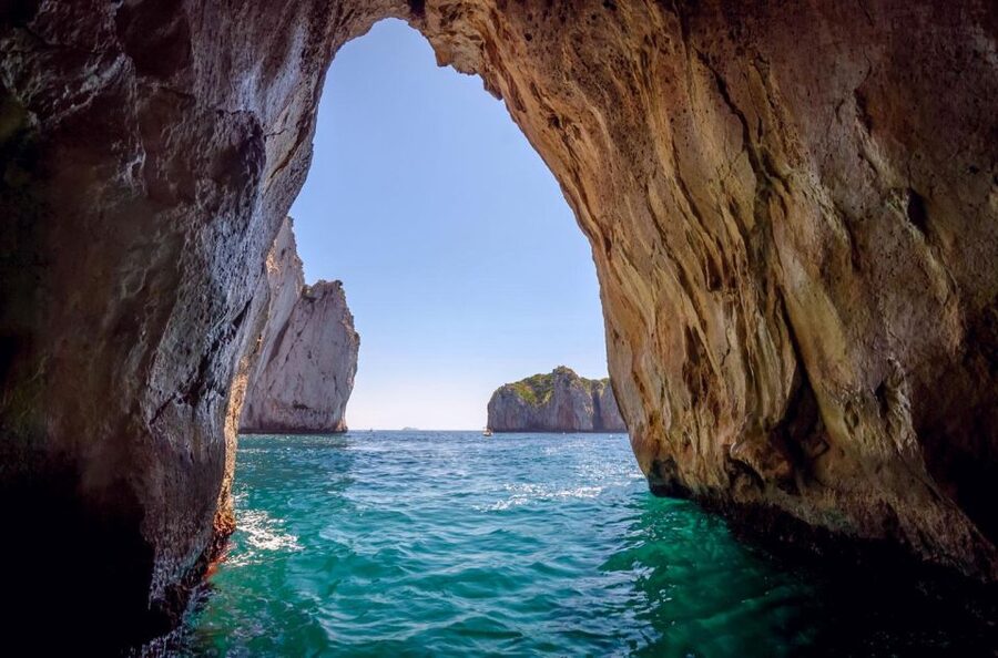 From Amalfi: Capri Island Boat Tour with Snorkeling & Drinks - Faraglioni, Villa Jovis, and the sea caves