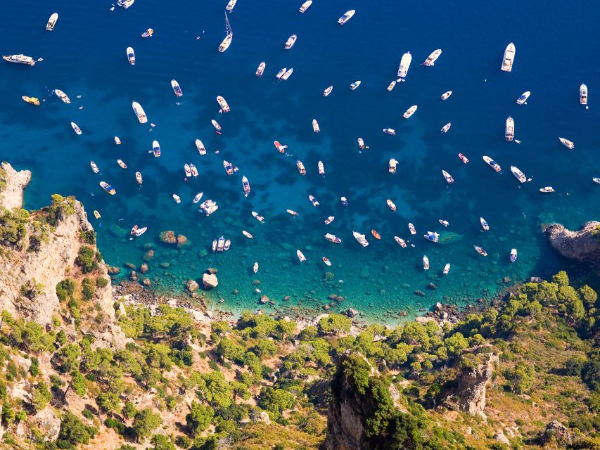 From Sorrento: Capri and Blue Grotto Boat Tour - The Natural Arch, Faraglioni, and Malaparte’s villa
