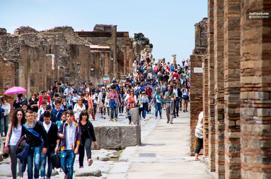 From Sorrento: Pompeii Ruins All-inclusive Guided Tour - Arriving at Pompeii and joining the guide