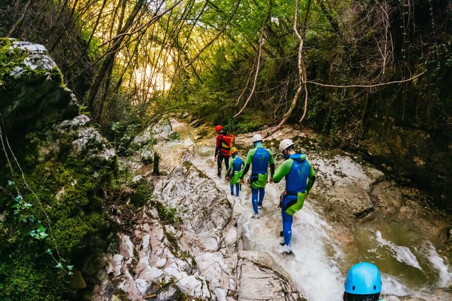 From Tignale, Lake Garda: Beginner-Friendly Canyoning Tour - The 5-meter jump and the 14-meter slide