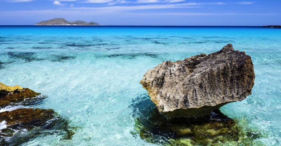 From Trapani: Favignana and Levanzo Mini Cruise with Lunch - Favignana’s coves from the sea