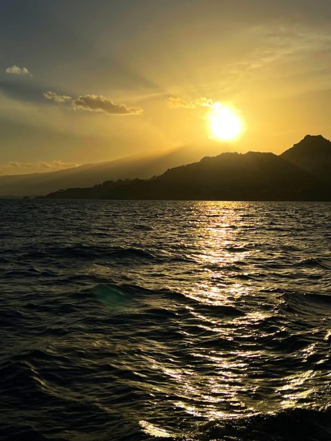 Giardini Naxos Taormina: Dolphin Watching Sunset Tour - Sunset views of Giardini Naxos and Mount Etna