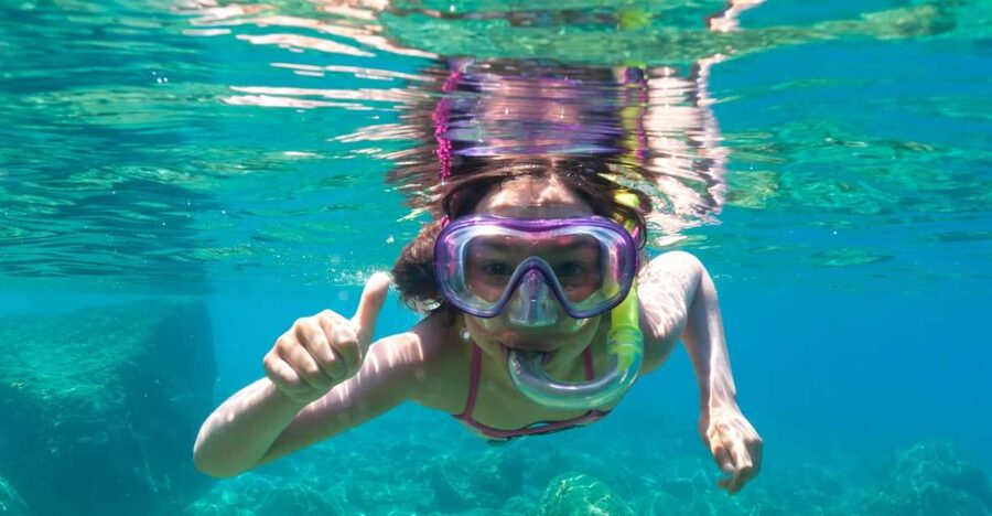 Golfo Aranci: Dolphin Watching and Snorkeling Boat Tour - Setting out from Sos Aranzos toward Capo Figari