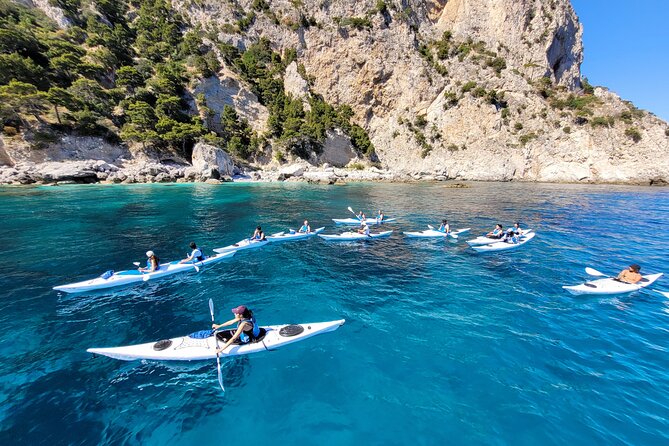 Kayak tour in Capri between caves and beaches. Photos included. - Starting at Marina Piccola and Scoglio delle Sirene