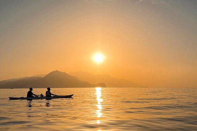 Kayak tour in Capri between caves and beaches. Photos included. - Timing, weather, and what to pack