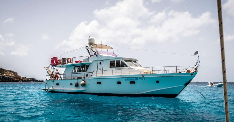Lampedusa: Yacht excursion, swimming stops and typical lunch - Capo Ponente and the old steamship wreck