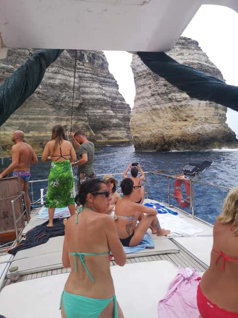 Lampedusa: Yacht excursion, swimming stops and typical lunch - Safety and comfort on a full day at sea