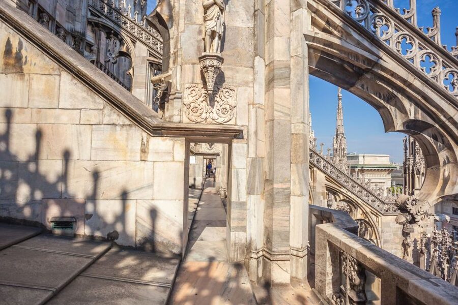 Milan: Duomo Rooftop and Cathedral Guided Tour with Tickets - Taking the lift toward the rooftop terraces
