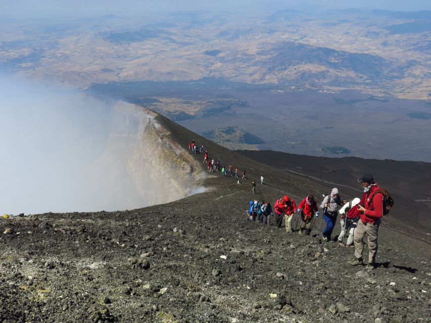 Mount Etna: Summit Crater Trek with Cable Car - The descent through volcanic sand