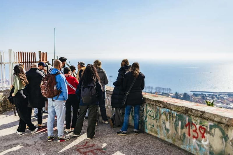 Naples: Panoramic Walking Tour with Funicular - Walking into the Spanish Quarter and historic center