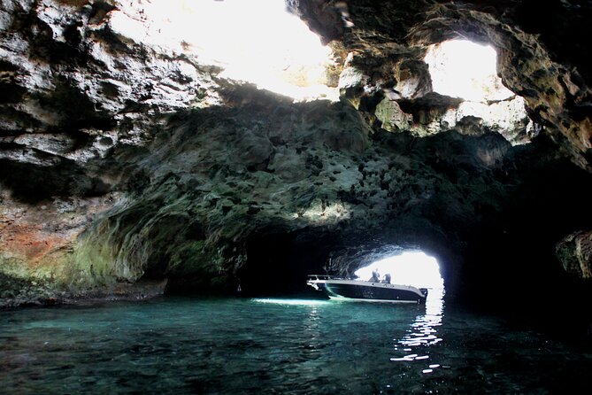 Polignano a Mare boat tour emotions, caves, diving and appetizers - The skipper, music, and mood on board