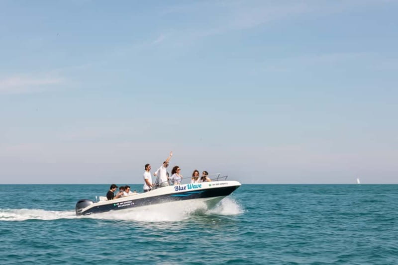 Polignano a Mare: Boat Tour with Prosecco and Snacks - Grotta Palazzese From a Better Angle