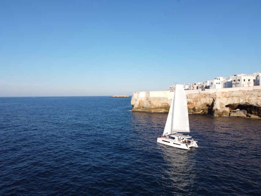 Polignano a Mare: Catamaran Tour with Aperitif & Local Food - The Hermit’s Rock and Cala Port’Alga