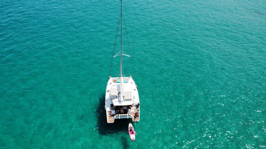 Polignano a Mare: Catamaran Tour with Aperitif & Local Food - Cala Corvino: 50 minutes for swimming and paddleboarding