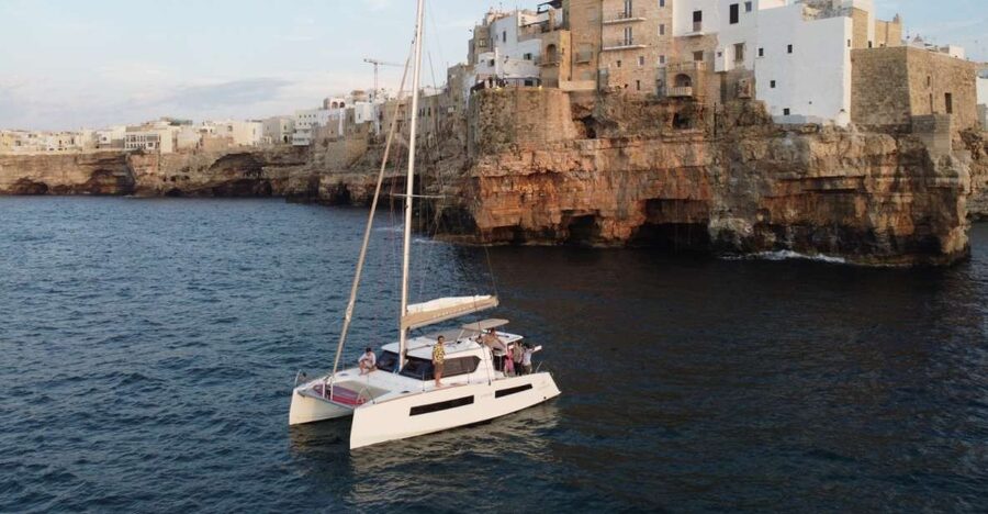 Polignano a Mare: Catamaran Tour with Aperitif & Local Food - Lama Monachile and the Bourbon bridge