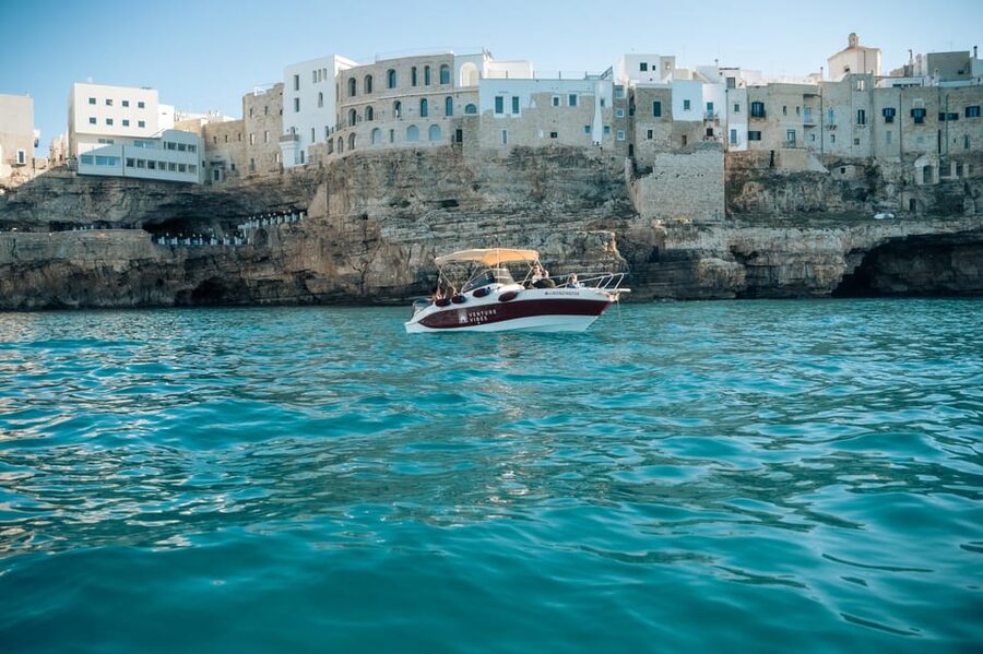 Polignano Sea Caves: Boat Tour with Snorkeling & Aperitif - Commentary, captains, and language support