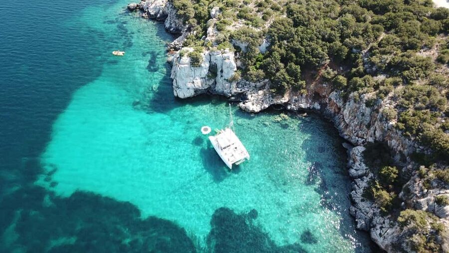 Porto Conte: Half-day catamaran tour with aperitif - Starting at Marina di Porto Conte