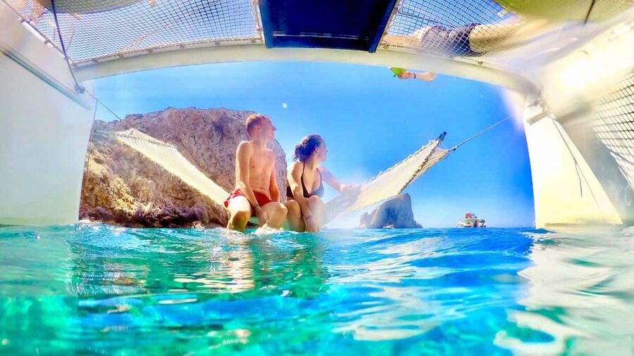 Porto Conte: Half-day catamaran tour with aperitif - Sardinian sausage, pecorino, and white wine